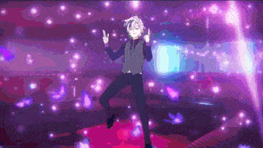 a man in a suit is dancing on a stage