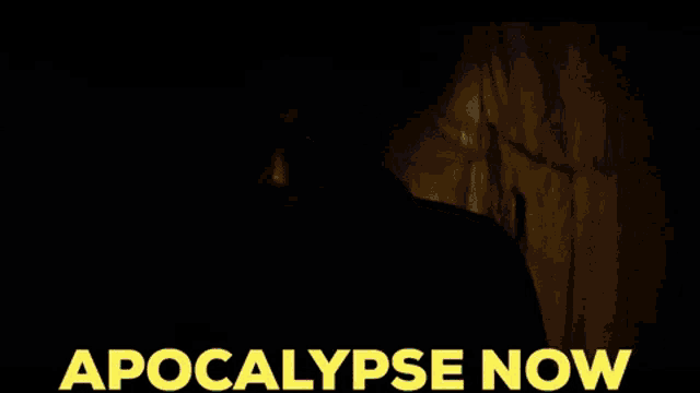 a poster for apocalypse now with a man in the dark