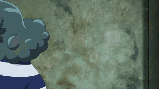 a cartoon character is standing in front of a wall that says tv tokyo