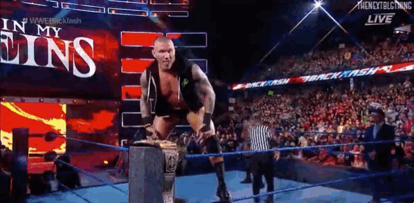 a wrestler is jumping over a rope with the words in my sins behind him