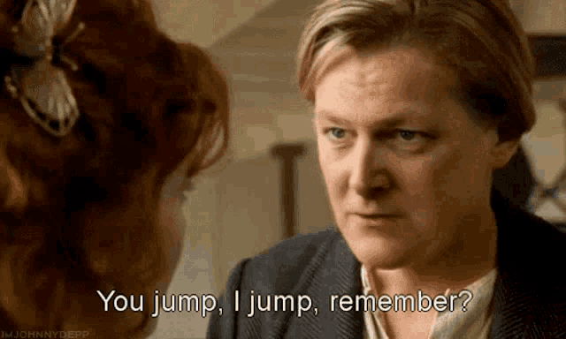 a woman is talking to another woman and says " you jump i jump remember ? "
