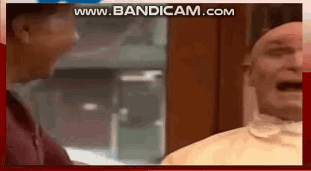 a man is getting his head shaved in a video that is being uploaded to www.bandicam.com .