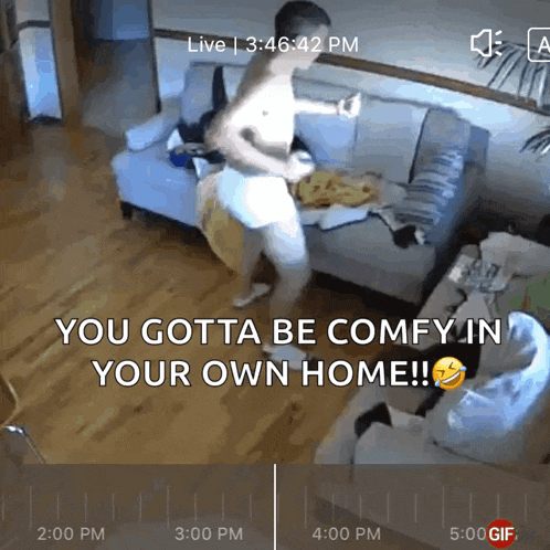 a man dancing in a living room with the words you gotta be comfy in your own home on the bottom