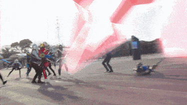a group of people are fighting each other with a red light behind them