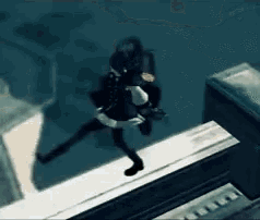 a cartoon character is standing on a ledge in a video game