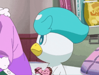 a cartoon character with a blue hat and a yellow beak is eating a candy