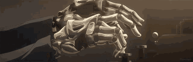 a close up of a robot 's hand holding a ball in a room .