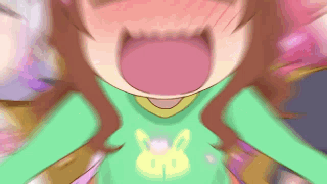 a girl in a green shirt with a bunny on it is making a funny face