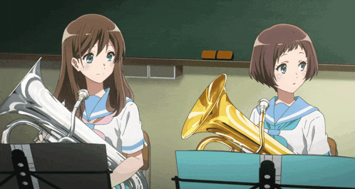 two anime girls are playing instruments in front of a chalkboard