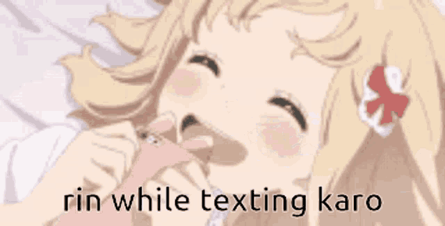 a girl is laying on a bed with the words `` rin while texting karo '' written on the bottom .