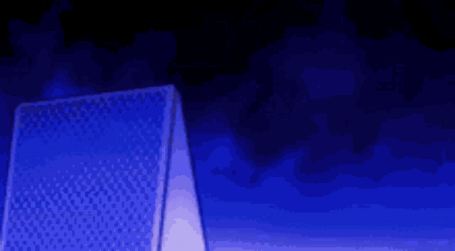 a person is flying through the air in a dark blue background .