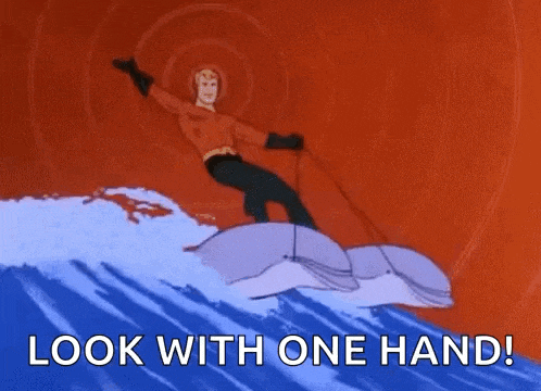 a cartoon of aquaman riding a wave on a dolphin with the words `` look with one hand ! ''