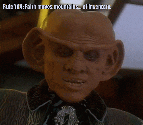 a close up of a man 's face with the words rule 104 faith moves mountains of inventory below him