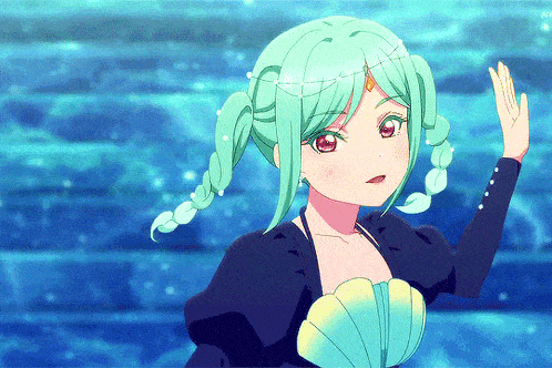 a girl with green hair and red eyes is wearing a seashell top