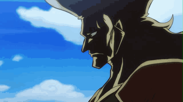 a close up of a man 's face with a blue sky behind him