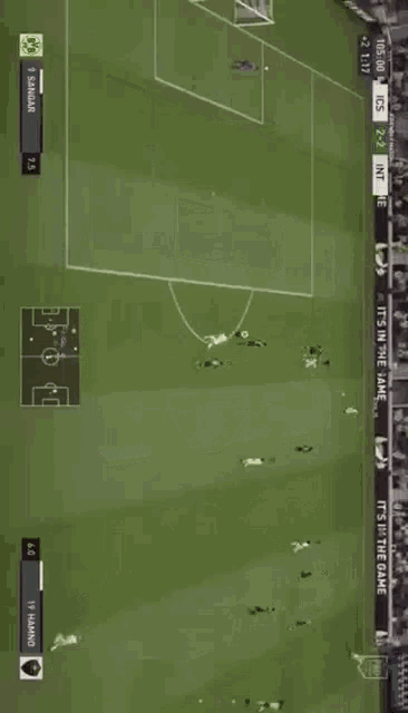 a soccer game is being played on a computer and the score is 1-0
