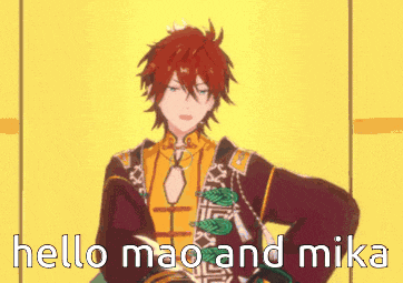 a cartoon character is making a peace sign and the words hello mao and mika are below him