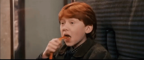 Eating Ron Weasley GIF - Eating Ron Weasley Harry Potter GIFs