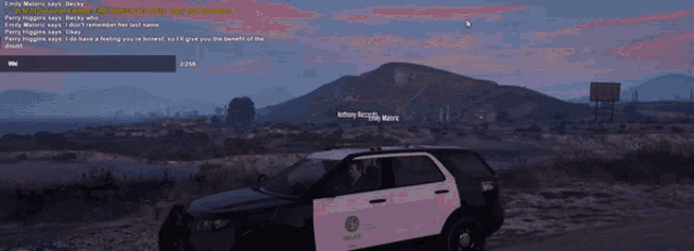 a screenshot of a video game shows a police car driving down a highway