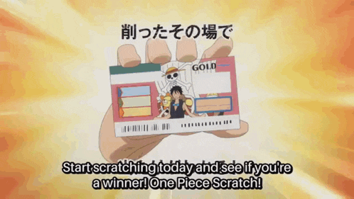 a person is holding a one piece gold card