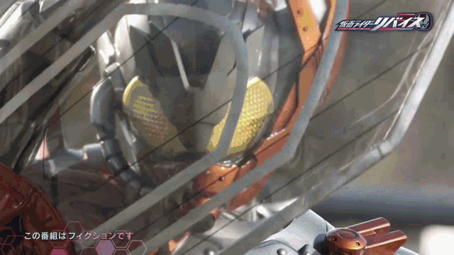 a close up of a robot with the word kamen rider on the bottom left