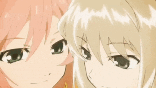 two anime girls are looking at each other and one has pink hair