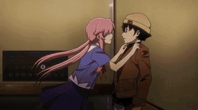 a boy and a girl are standing next to each other in front of an elevator