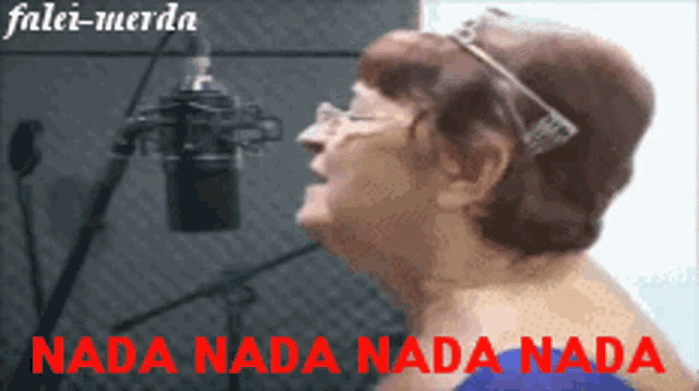 an older woman singing into a microphone with the words nada nada nada nada in red