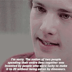 a close up of a person 's face with the words " i 'm sorry " written below it
