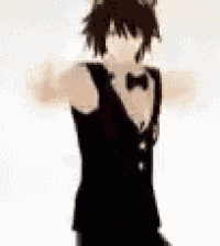 a man in a tuxedo and bow tie is standing with his arms outstretched on a white background .
