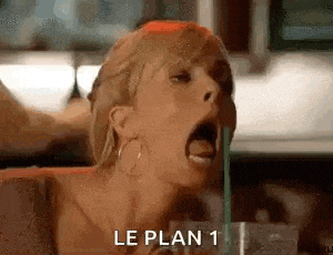 a woman is drinking through a straw with her mouth open and the words `` le plan 1 '' written next to her .
