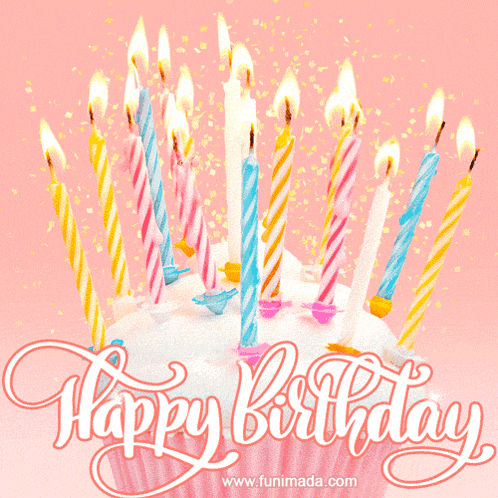 a pink cupcake with candles and the words happy birthday on the bottom
