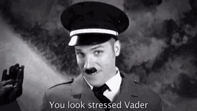 a man in a military uniform says " you look stressed vader " in a black and white photo