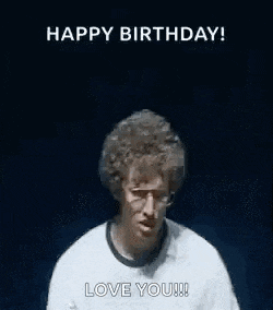a man is making a funny face while holding his hands up in the air and saying `` happy birthday ! love you ! ''