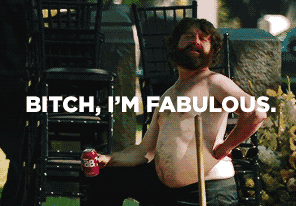 a shirtless man holding a can of pabst beer