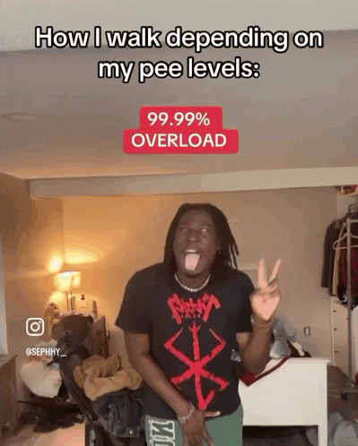 a man wearing a black shirt that says berserk on it