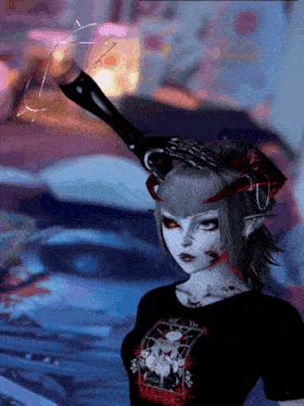 a girl with horns is wearing a black t-shirt with a picture of a demon on it