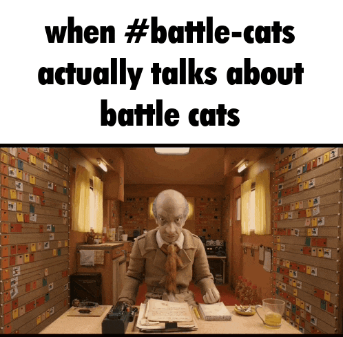 a picture of a man sitting at a desk with the words " when #battle-cats actually talks about battle cats "