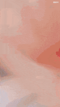 a close up of a woman 's face with red lipstick on her lips .