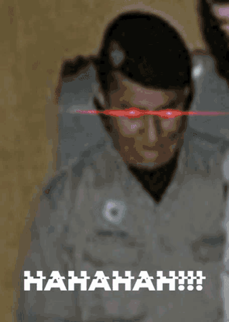 a blurred image of a man with red eyes and the words '  hahahah ' on the bottom