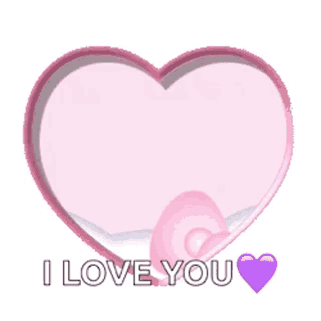 a pink heart with the words `` i love you '' written on it .