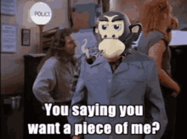 a man wearing a monkey mask is saying you saying you want a piece of me