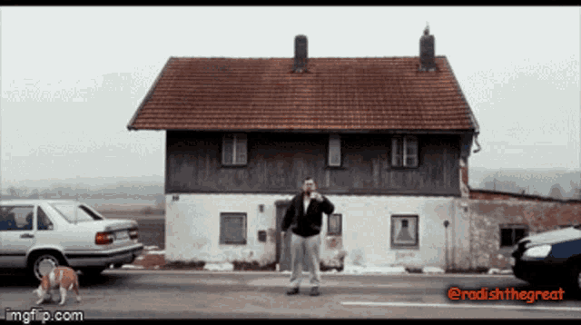 a picture of a man standing in front of a house with the hashtag radishthegreat