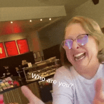a woman wearing sunglasses is giving a thumbs up and says who are you