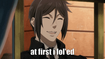 a man in a suit and tie is smiling with the words at first i lol 'ed below him