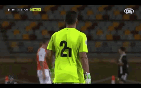a soccer player with the number 2 on his back