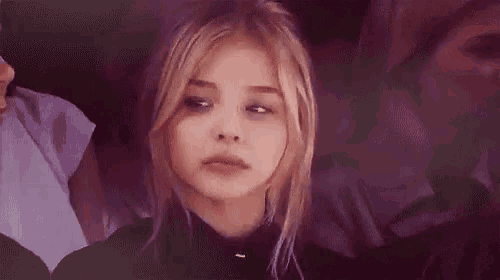 a girl with the word chateada on the bottom of her face