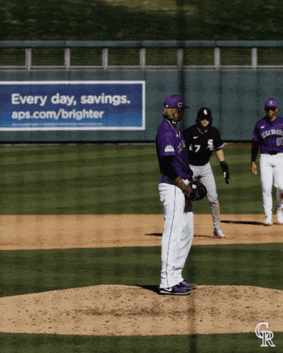 baseball players on a field with a sign that says " every day savings aps.com/brighter "