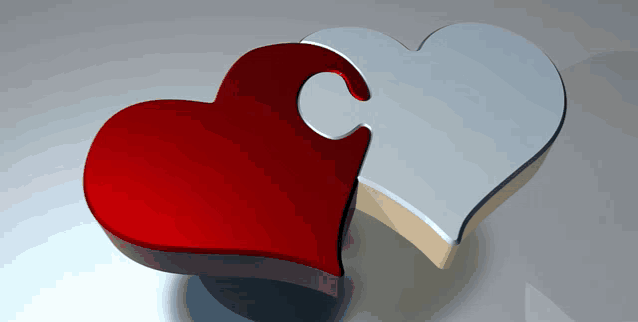 a red heart and a white heart are connected together by a puzzle piece