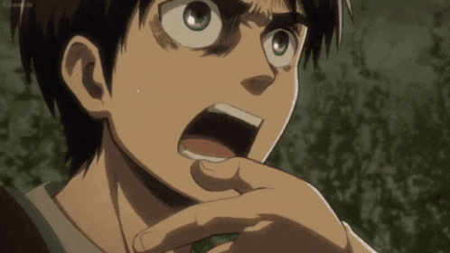 a close up of a person 's face with a hand covering their mouth